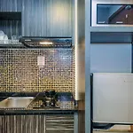 Warm And Cozy Studio At The Oasis Cikarang Apartment By Travelio